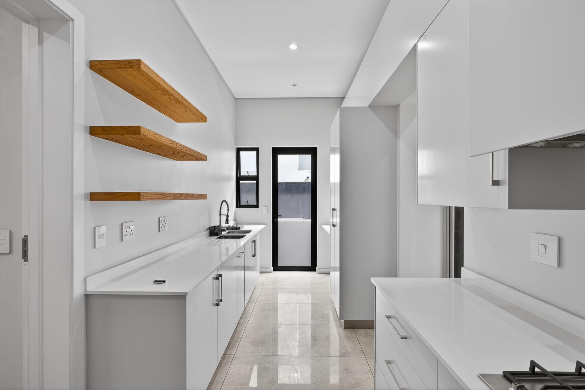 Architectural Triple-Storey Residence with Private Greenbelt Views — photograph 5